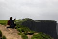 photographer on cliffs of moher