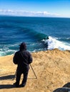 a photographer on cliffs santa cruz