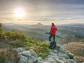 Photographer climbed on peak for photographing the sunrise