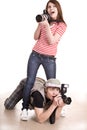 Photographer couple with digital camera. Royalty Free Stock Photo