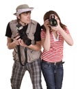 Photographer couple with digital camera. Royalty Free Stock Photo