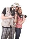 Photographer couple with digital camera. Royalty Free Stock Photo