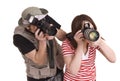 Photographer couple with digital camera. Royalty Free Stock Photo