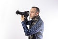 Photographer with digital reflex camera. Copy space at white background