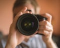 Photographer doing self portrait in a mirror. Royalty Free Stock Photo