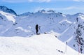 Photographer filming in the mountains. Ski resort Val Thorens