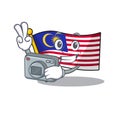 Photographer flag malaysia hoisted on cartoon pole