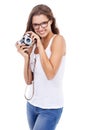 Photographer, happy woman and retro camera in studio for creative photoshoot, art blog and media production on white