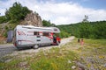 A photographer and her baby girl and their camper van in the Vikos-Aoos national park in Greece