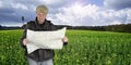 Photographer hiker with map Royalty Free Stock Photo