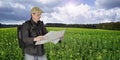 Photographer hiker with map Royalty Free Stock Photo