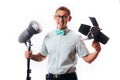 Photographer in his studio setting up lights for the upcoming photoshoot Royalty Free Stock Photo