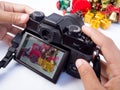 The photographer is intending to use digital camera take pictures of the Christmas decoration, Have a nice holiday on this Royalty Free Stock Photo