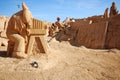 Photographer large sand sculpture, Portugal.