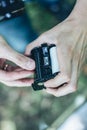 Photographer loading medium format film into the film back Royalty Free Stock Photo