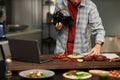 Photographer making photo of still life on camera Royalty Free Stock Photo