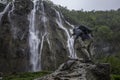 Photographer is making photo of wonderful waterfalls in Plitvice