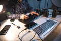 Photographer man hand graphic tablet on desk.