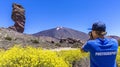 Photographer near the Teide volcano in Tenerife. The volcano El Teide in Tenerife, Spain Royalty Free Stock Photo