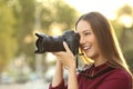 Photographer photographing with a digital camera