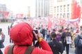 A photographer photographs a festive procession in Moscow, May 9, 2022, an immortal regiment