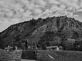 The photographer photographs the rocky Braunsberg hill in Hainburg in black and white, Austria