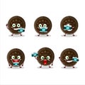 Photographer profession emoticon with chocolate biscuit cartoon character Royalty Free Stock Photo