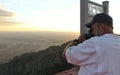A Photographer on the Sandia Peak Aerial Tramway Observation Dec Royalty Free Stock Photo