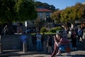 The photographer in the sun, Sausalito California on a Sunday afternoon