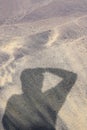 Photographer shadow on beach