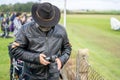 Photographer shooting at an air show.Race Day at Shuttleworth