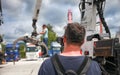 The photographer shoots and makes videos at the truck festival