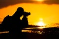 Photographer silhouette at sunset Royalty Free Stock Photo