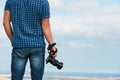 Photographer with digital camera in his hands Royalty Free Stock Photo