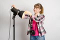 Photographer studio sets reflector on monoblock