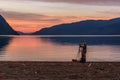 Photographer sunset lake mountains