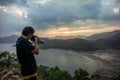 A photographer take photo at intertidal zone Royalty Free Stock Photo