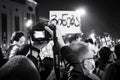 Photographer take photo of poster in street protest in Georgia capital Tbilisi