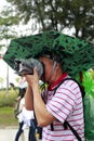 Photographer take pictures with rain equipment.