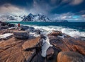 Photographer takes picture of Lofoten Islands.