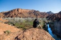 Photographer taking a landscape photo of gorgeous Dades Gorge valley Royalty Free Stock Photo