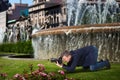 Photographer taking macro picture of flowers