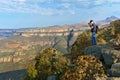 Photographer taking photo of beautiful view of Blyde river canyon