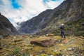 photographer taking a photo in franz josef glacier in south island new zealand importanat natural traveling destination Royalty Free Stock Photo