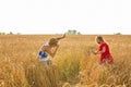 Photographer taking photos of girl model in a beautiful field