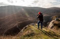 Photographer taking photos in mountains Royalty Free Stock Photo