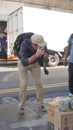 Photographer taking photos in the street in Mauritius