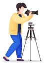 Photographer is taking picture. Photographer character web icon with camera and professional tripod Royalty Free Stock Photo