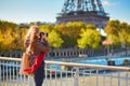 Photographer taking picture of the Eiffel tower Royalty Free Stock Photo