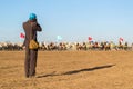 Photographer taking a picture of horse riders